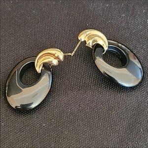 Vintage 14k solid gold and black onyx earrings.